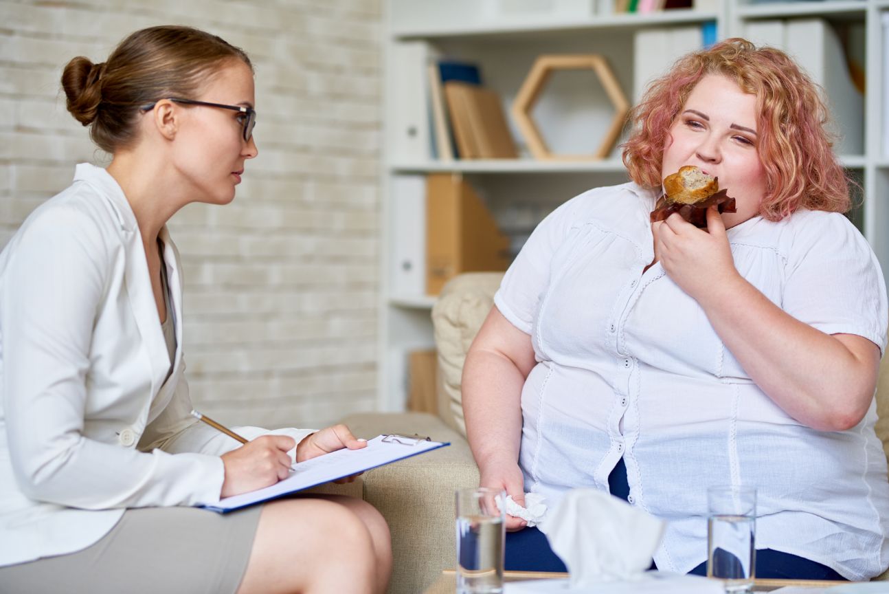 obese woman consulting about eating disorder stgrvm