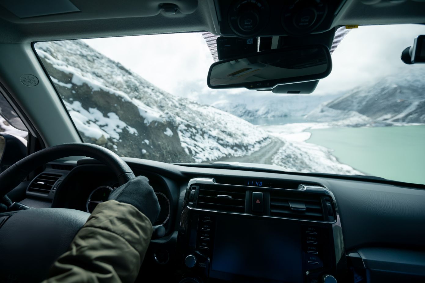 driving off road car on snowing high altitude moun MUSL