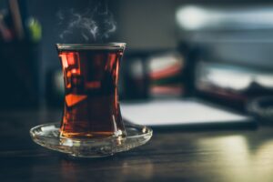 hot black tea inside a glass