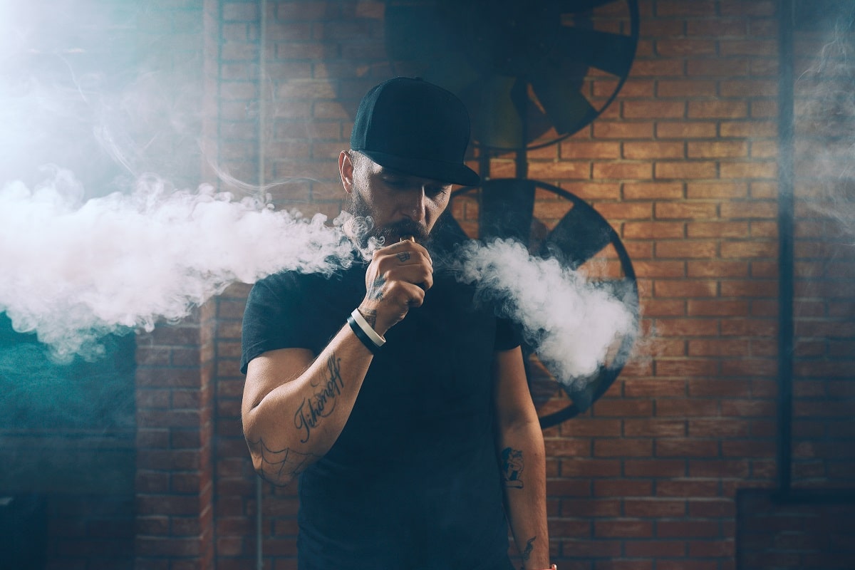 man vaping an electronic cigarette