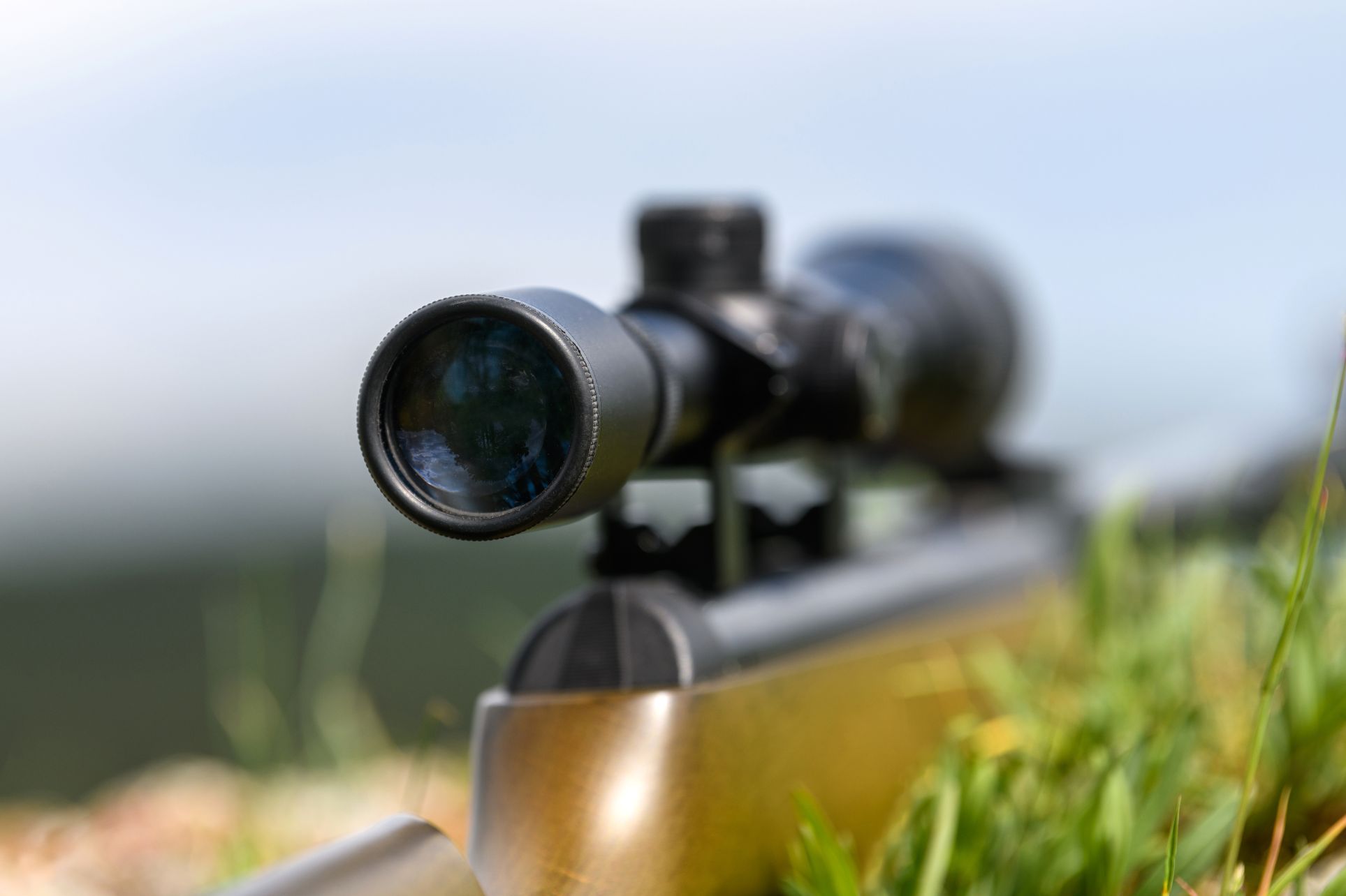 rifle scope on the street with blurry background h STV